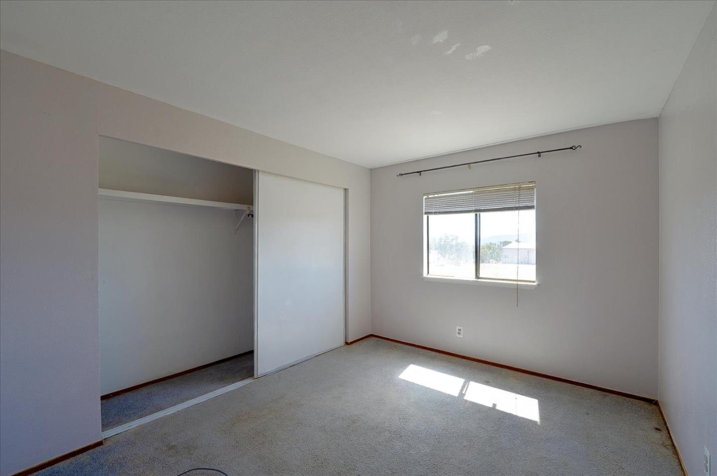 3040 Roop Road Gilroy, CA 95020 - Photo 20 of 63 an empty room with a window