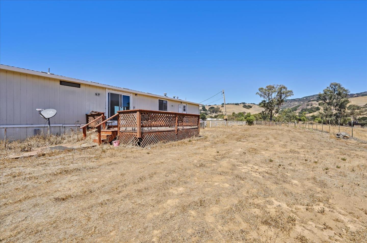 3040 Roop Road Gilroy, CA 95020 - Photo 2 of 63 a backyard of a house with table and chairs