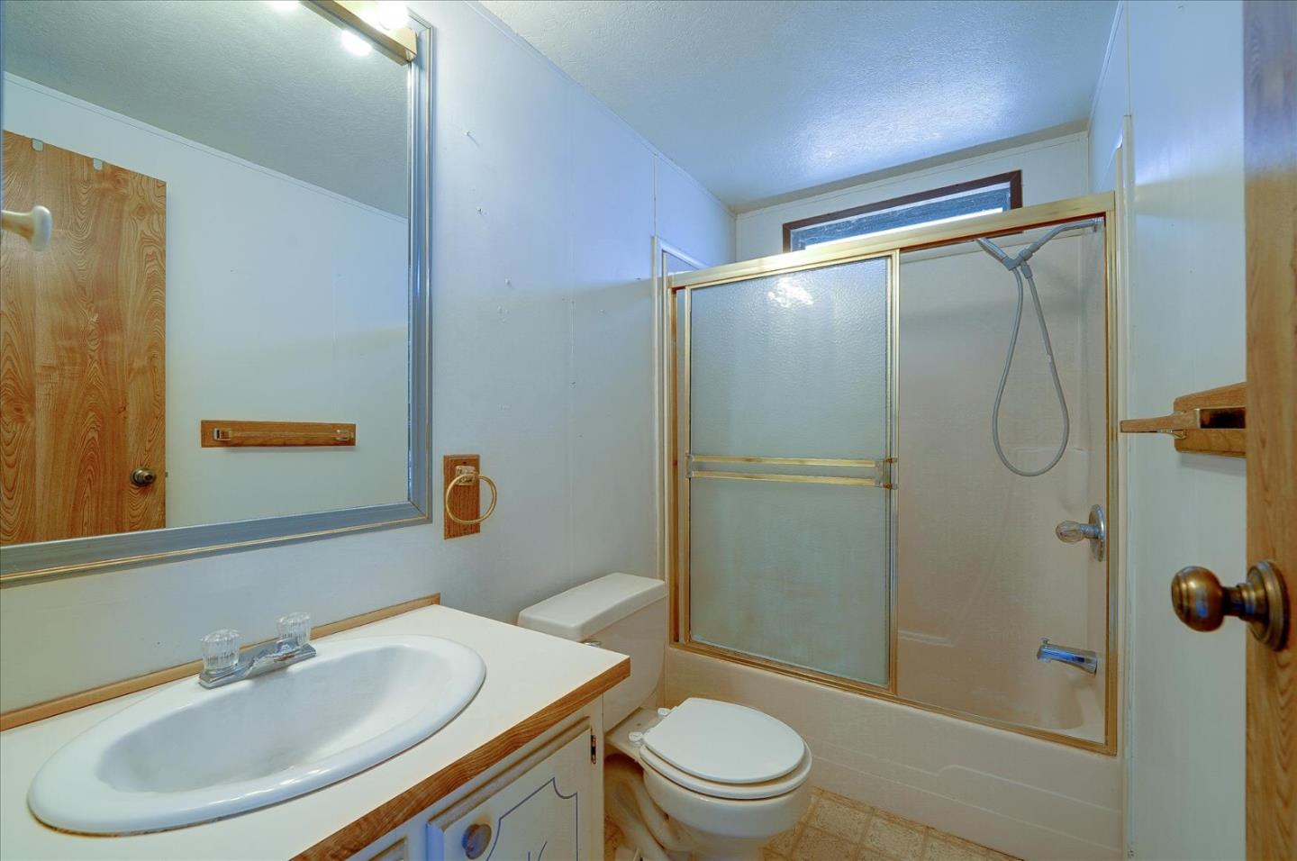 3040 Roop Road Gilroy, CA 95020 - Photo 34 of 63 a bathroom with a sink toilet and shower