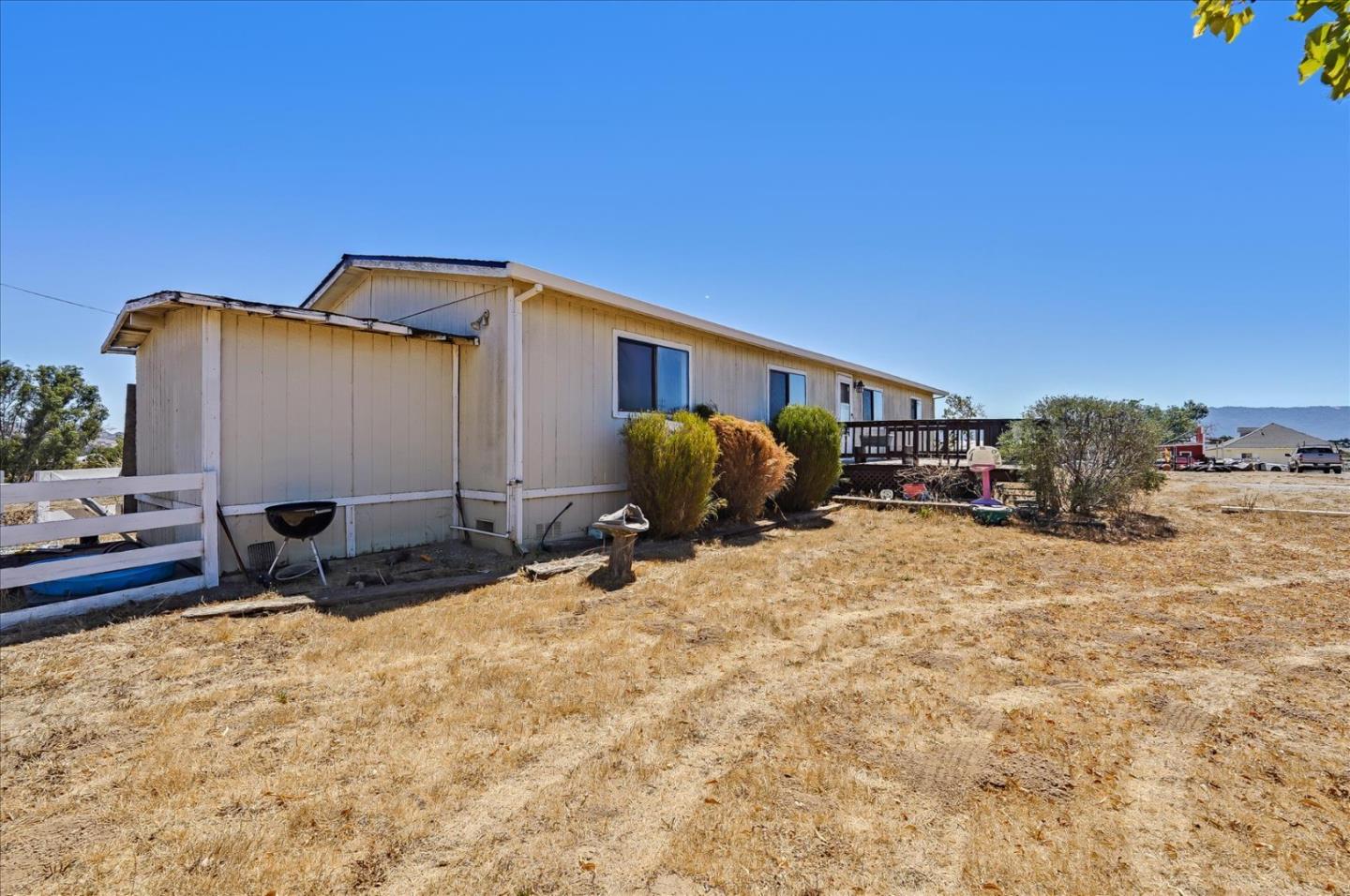 3040 Roop Road Gilroy, CA 95020 - Photo 48 of 63 a backyard of a house with table and chairs
