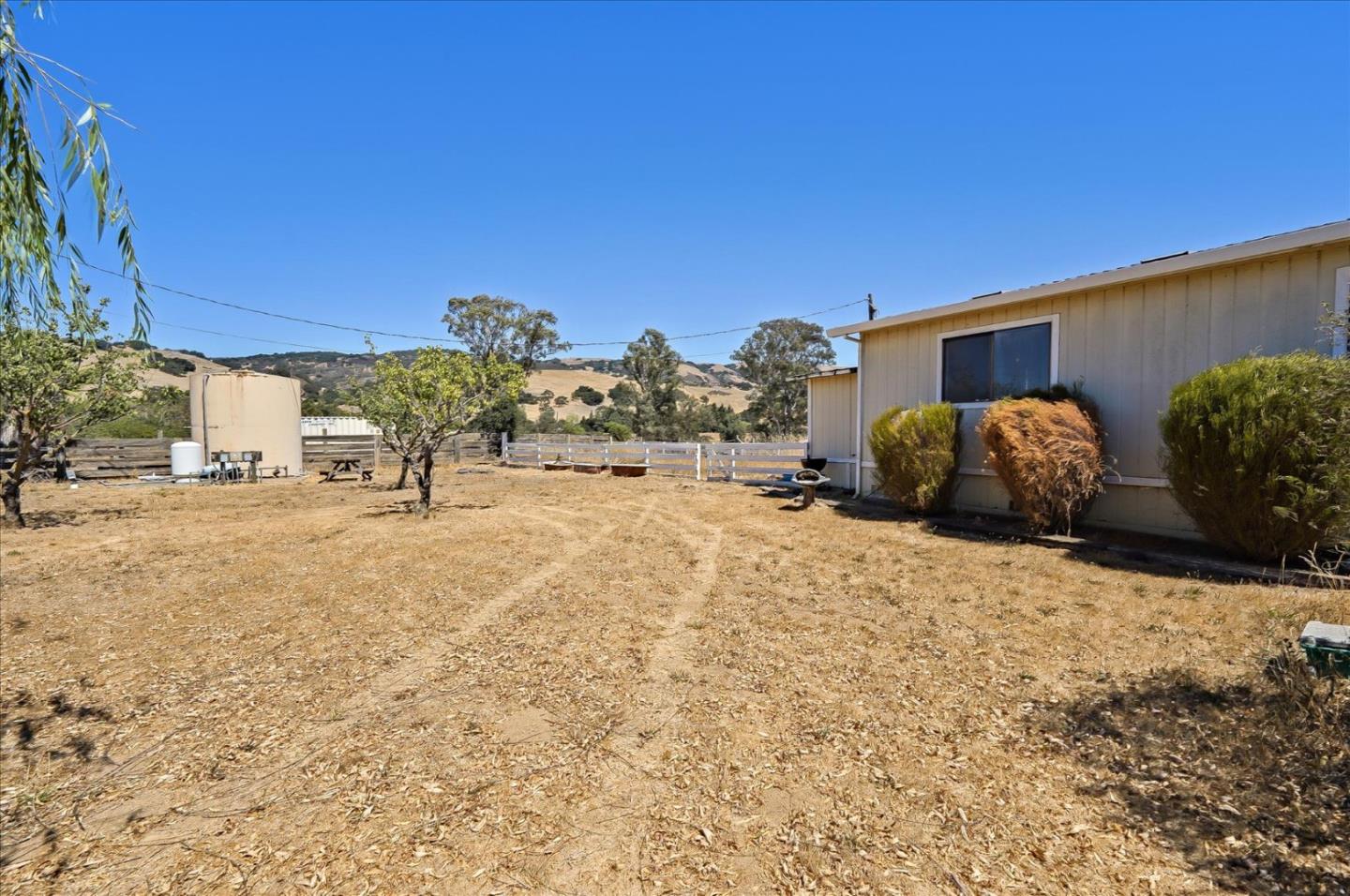 3040 Roop Road Gilroy, CA 95020 - Photo 49 of 63 a view of a house with a yard