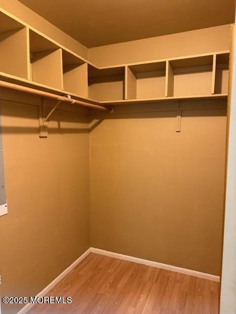 98 Arrowood Road, Unit C Manalapan, NJ 07726 - Photo 7 of 7 a view of small space with racks on the wall