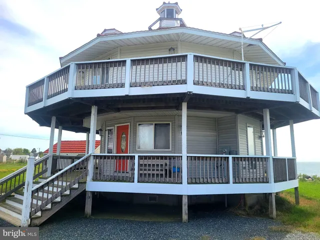 a view of a wooden house with a large window