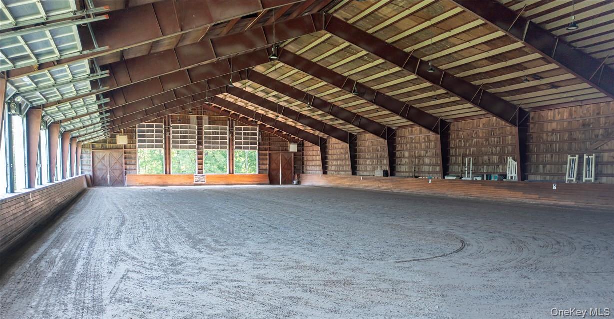 15 Kirby Hill Road Pawling, NY 12564 - Photo 15 of 37 An attached 200' x 90' indoor riding ring with equestrian sand with fiber footing, sound system, and retractable windows.