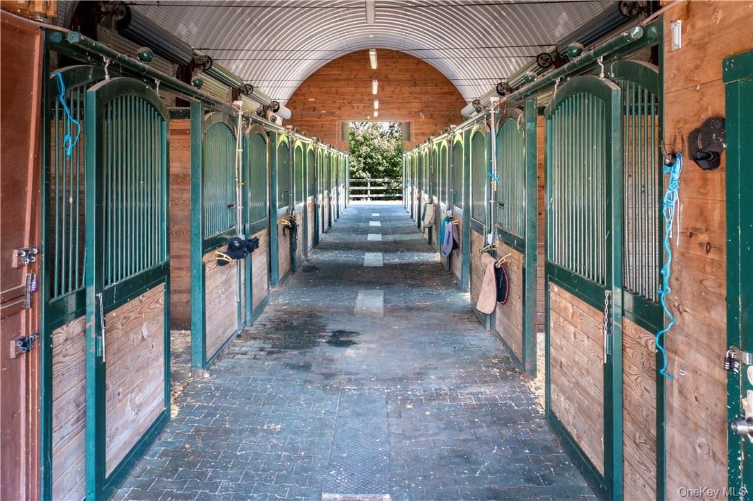 15 Kirby Hill Road Pawling, NY 12564 - Photo 24 of 37 The polo barn has 14 10' x 14' yoked stalls.