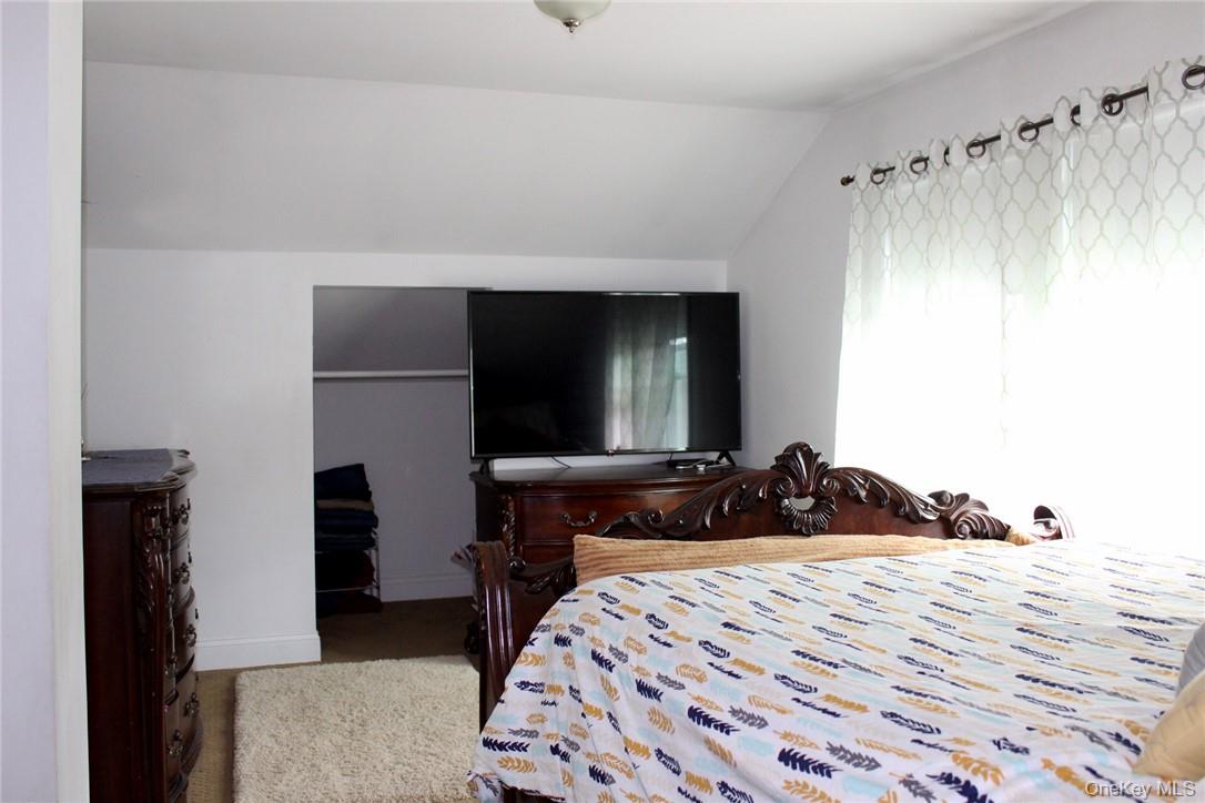 5834 Albany Post Road Cortlandt Manor, NY 10567 - Photo 11 of 14 Bedroom with lofted ceiling