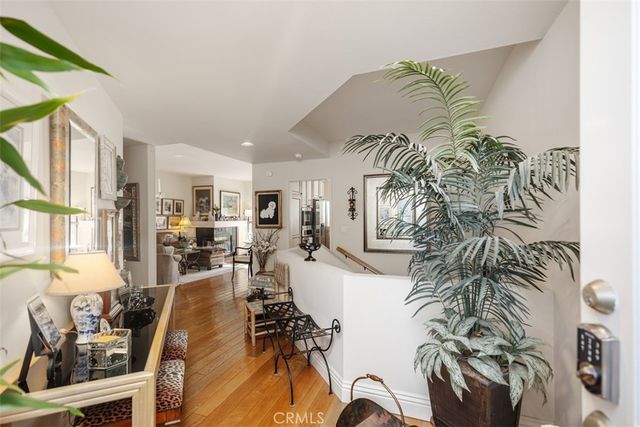 a view of a living room and dining room