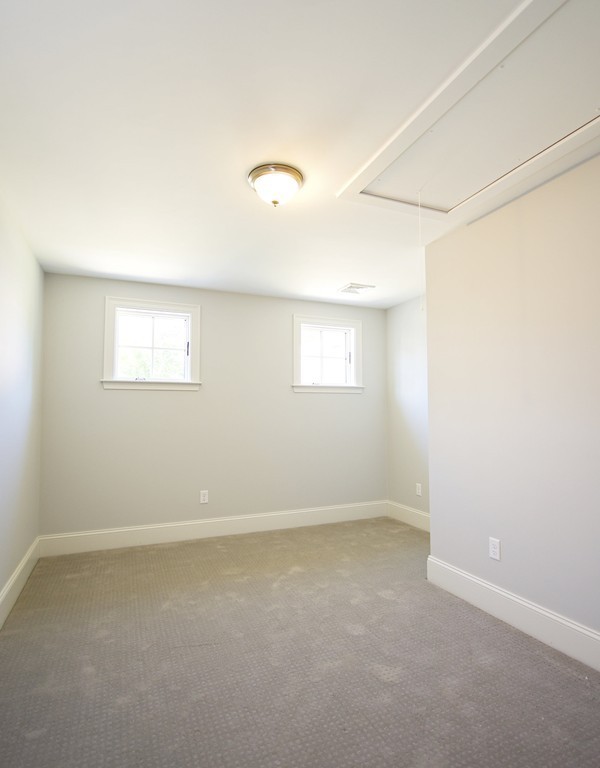180 First Parish Road Scituate, MA 02066 - Photo 22 of 26 an empty room with a window