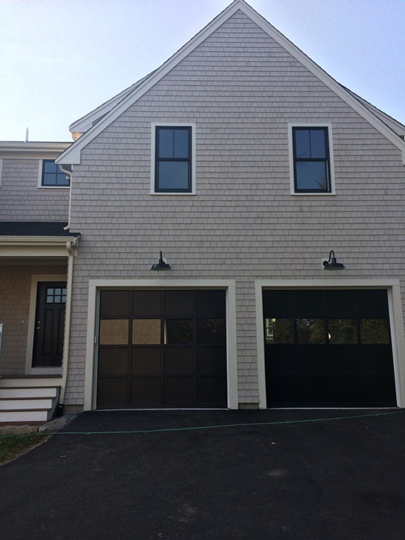 180 First Parish Road Scituate, MA 02066 - Photo 26 of 26 a front view of a house with yard