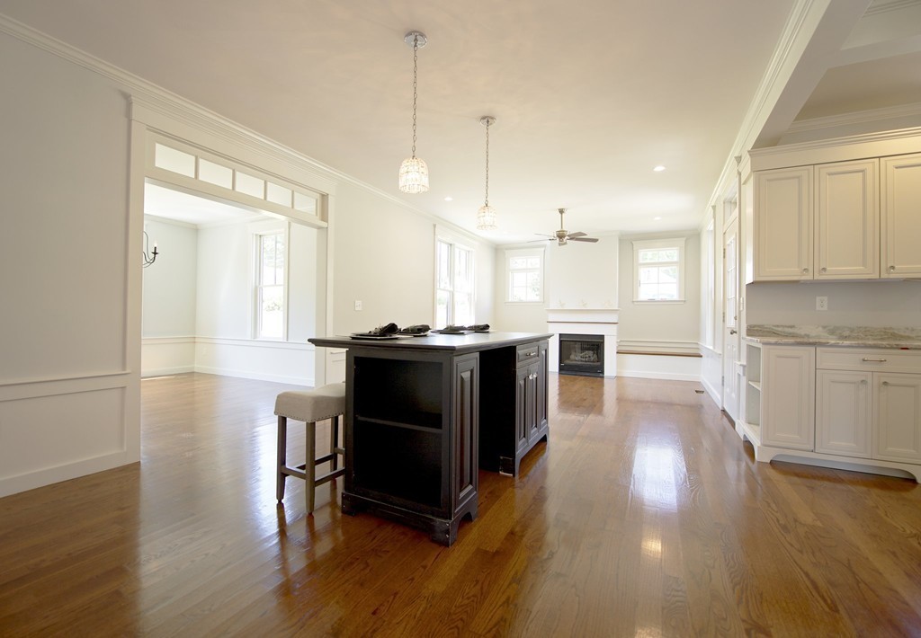 180 First Parish Road Scituate, MA 02066 - Photo 7 of 26 a kitchen with stainless steel appliances granite countertop a stove a sink and a refrigerator