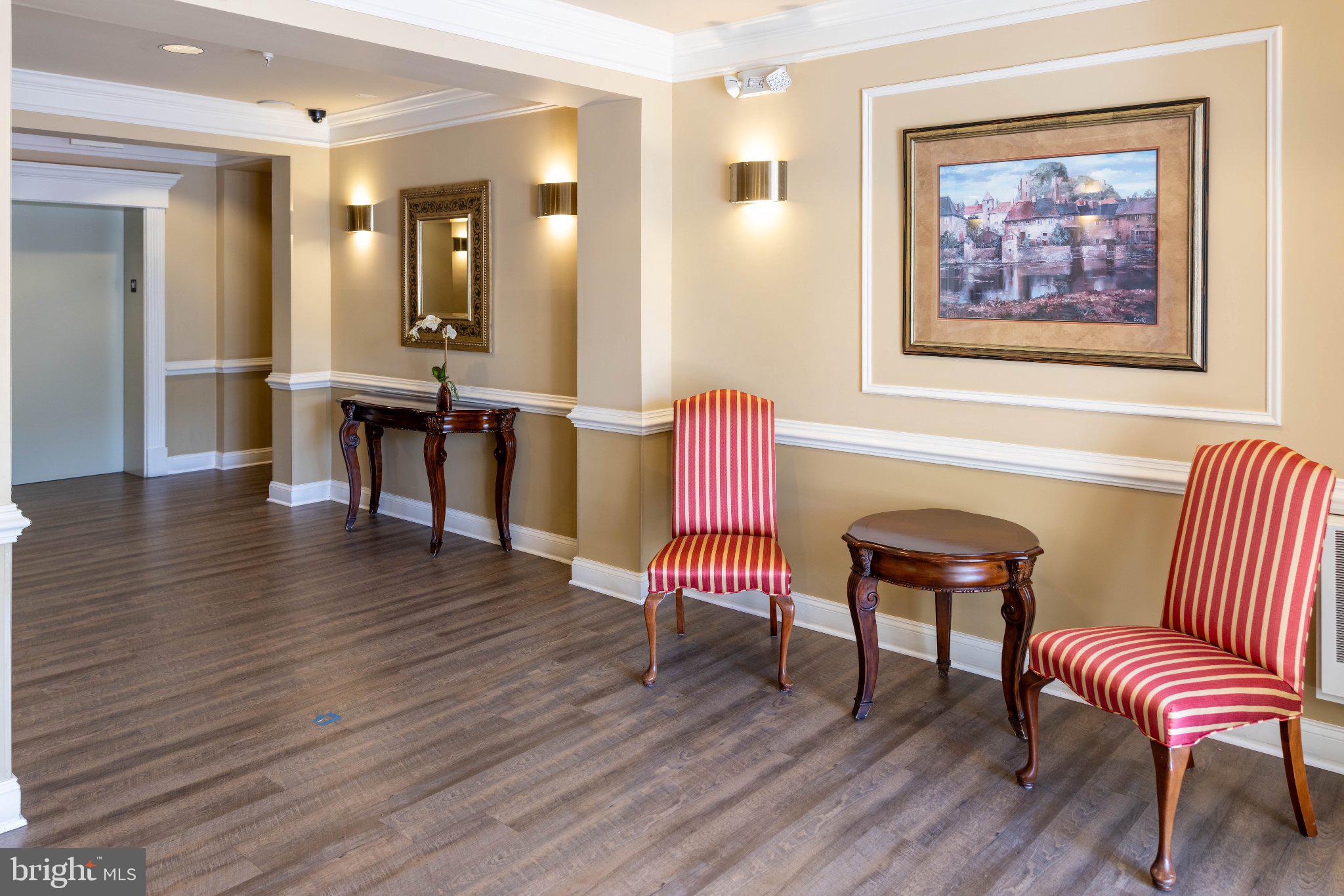 12824 Clarksburg Square Road, Unit 105 Clarksburg, MD 20871 - Photo 7 of 96 Elegant foyer with warm tones.