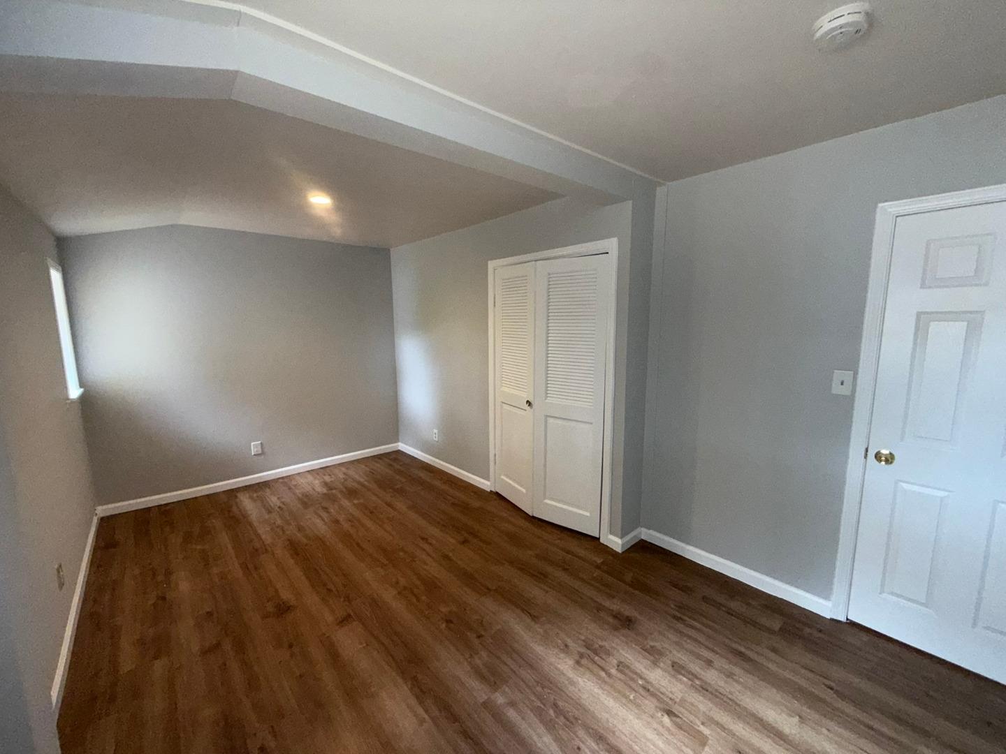11585 McCarthy Road Carmel Valley, CA 93924 - Photo 48 of 52 a view of an empty room and wooden floor