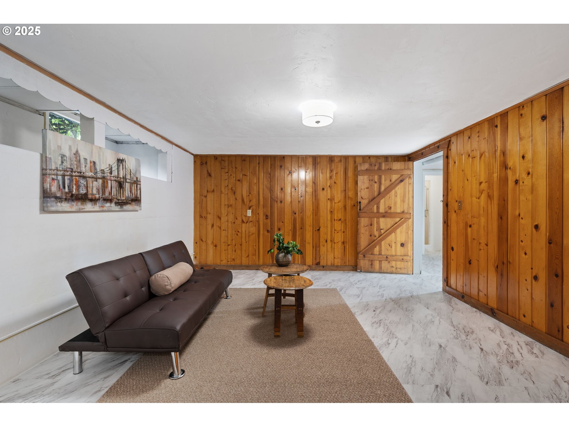 402 Skelton Road Stevenson, WA 98648 - Photo 29 of 48 a living room with furniture and large windows