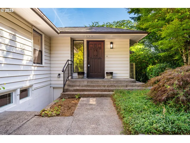 a view of a backyard with pathway
