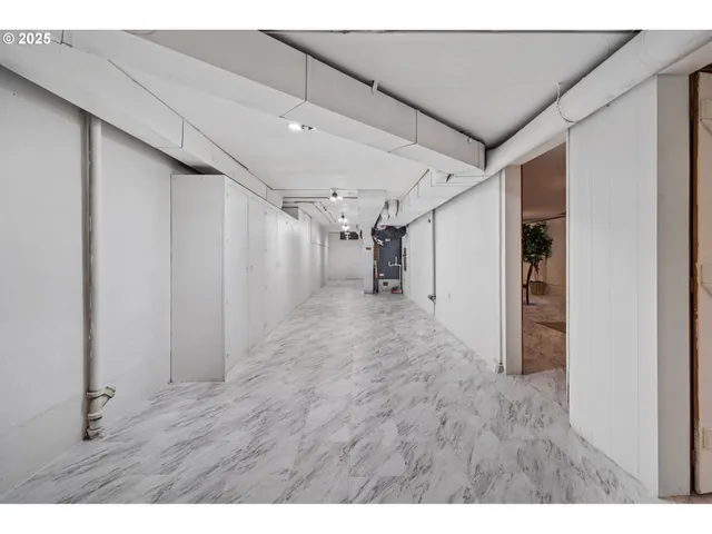 a bathroom with a toilet sink and shower