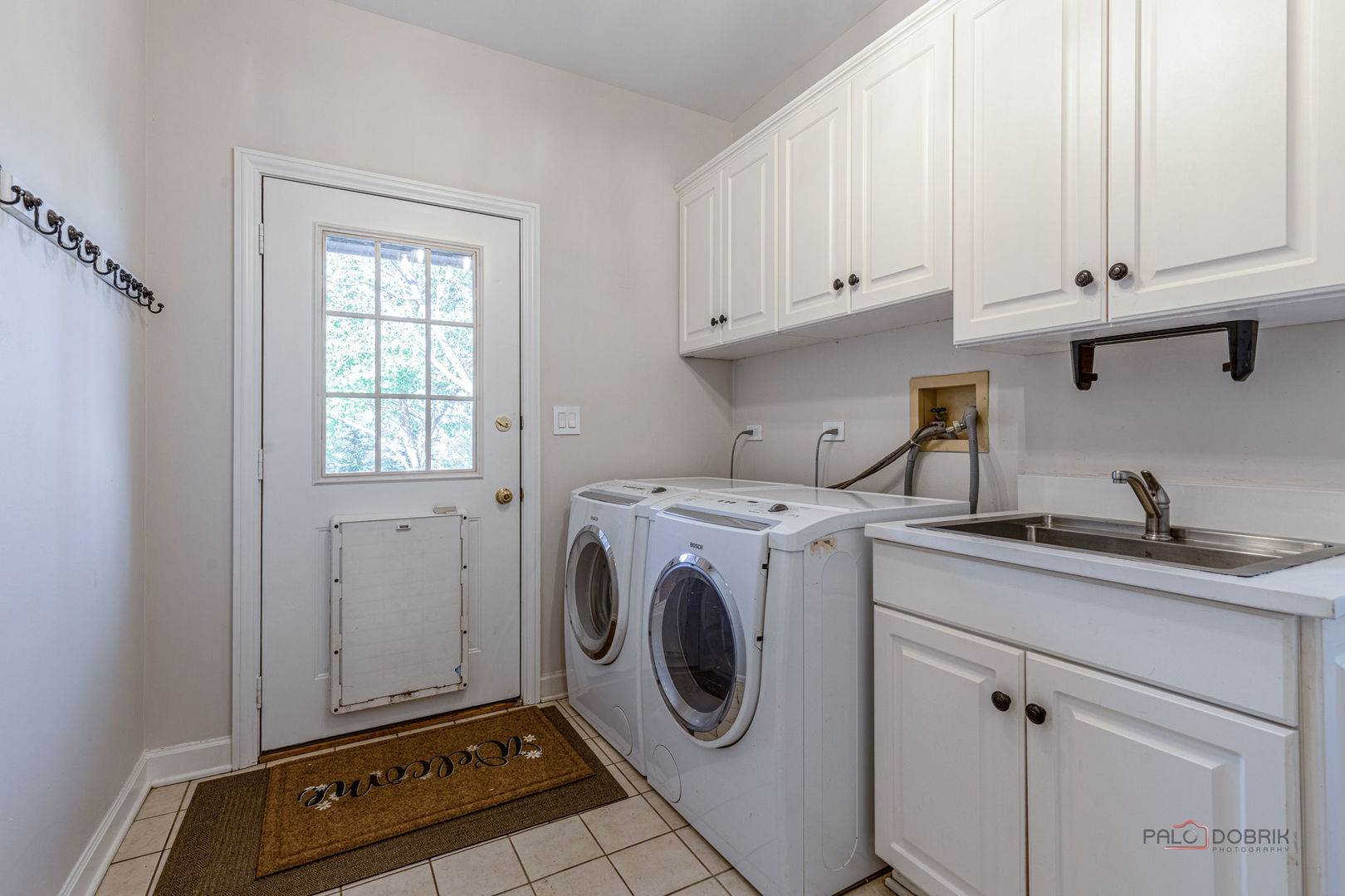 12 Riderwood Road North Barrington, IL 60010 - Photo 19 of 44 a utility room with sink dryer and washer