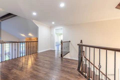 a view of entryway with wooden floor