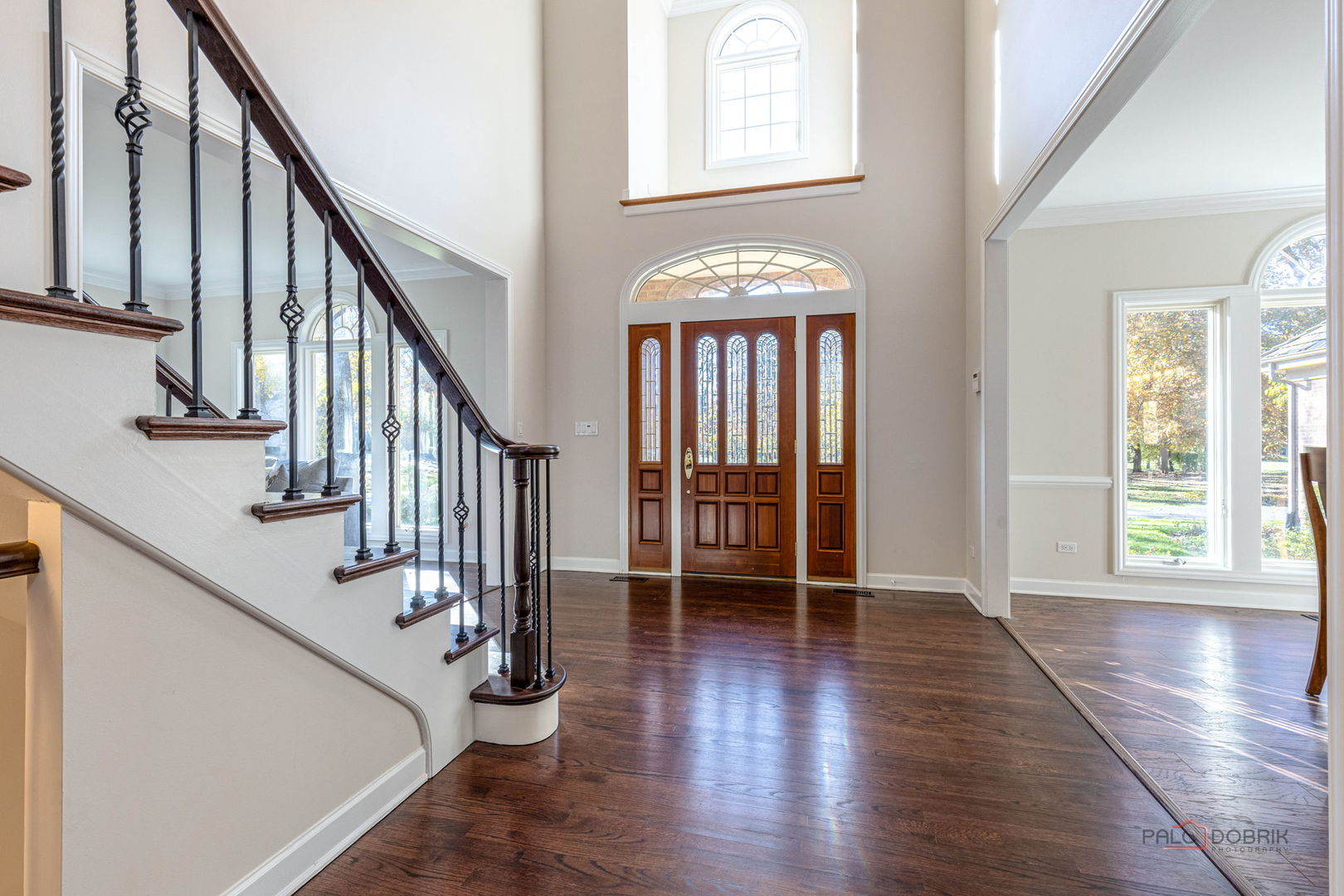 12 Riderwood Road North Barrington, IL 60010 - Photo 3 of 44 a view of an entryway with wooden floor and stairs