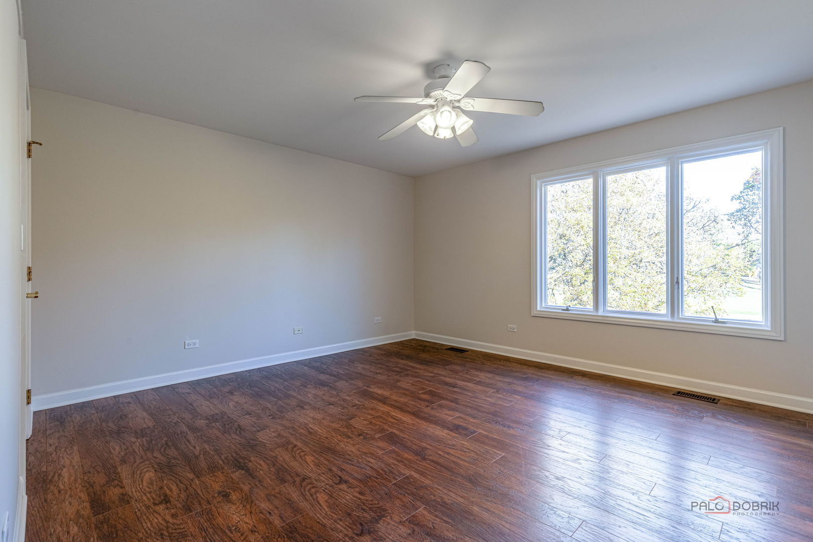 12 Riderwood Road North Barrington, IL 60010 - Photo 31 of 44 a view of an empty room with wooden floor and a window