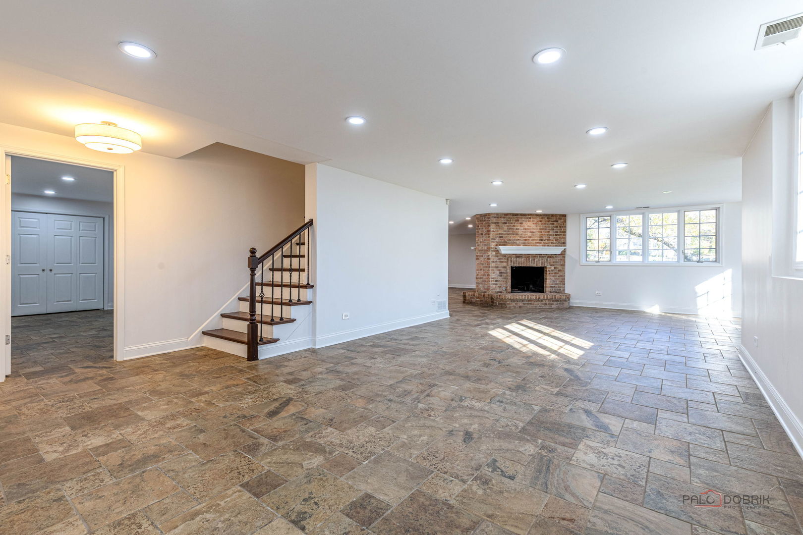 12 Riderwood Road North Barrington, IL 60010 - Photo 32 of 44 an empty room with windows and fireplace