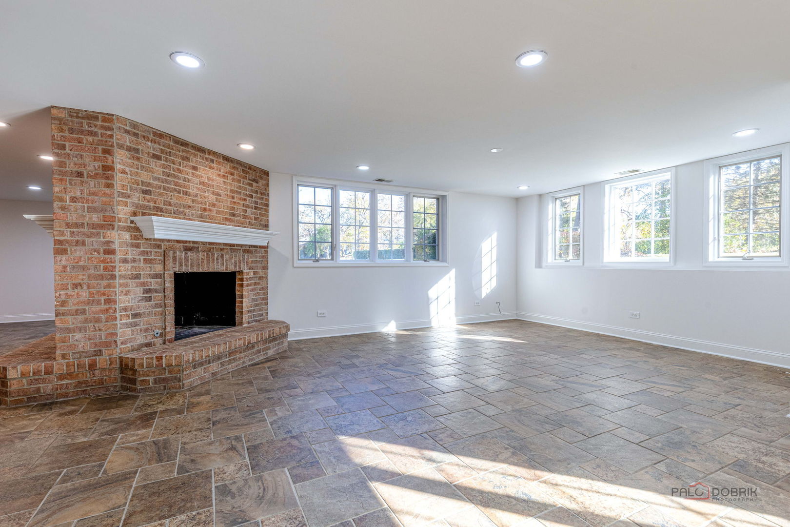 12 Riderwood Road North Barrington, IL 60010 - Photo 33 of 44 an empty room with windows and fireplace