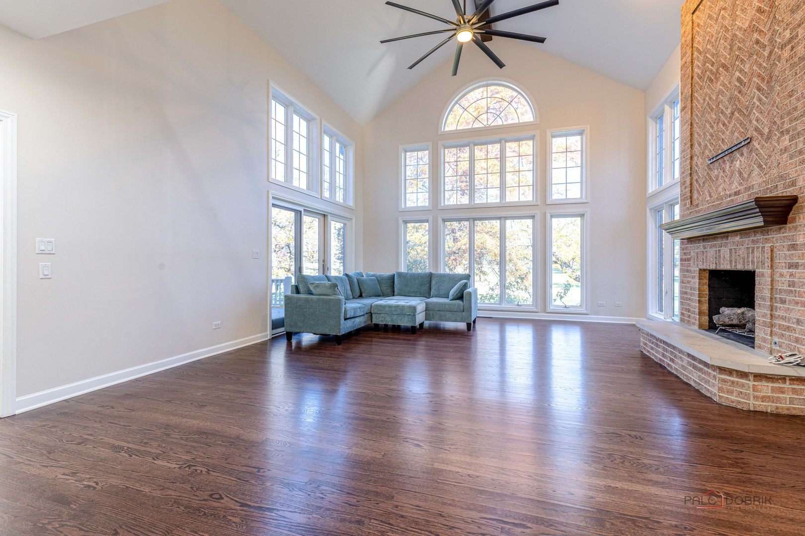 12 Riderwood Road North Barrington, IL 60010 - Photo 8 of 44 an empty room with wooden floor fan and windows