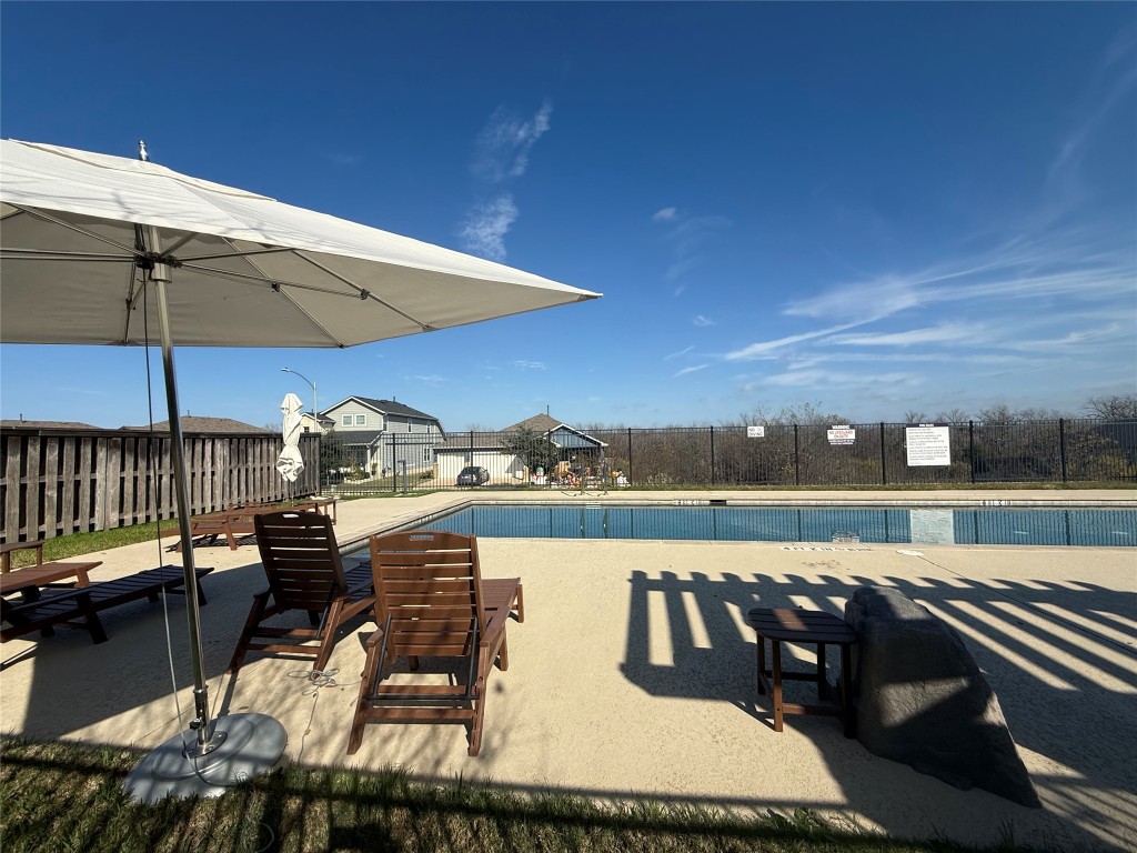 14601 Frankel Loop Pflugerville, TX 78660 - Photo 14 of 17 Community pool with a patio area