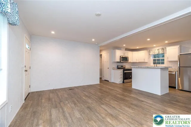 a view of kitchen with wooden floor