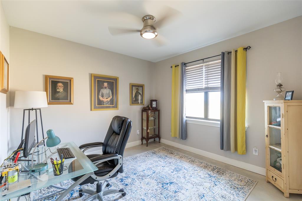 760 Wimberly Road Merkel, TX 79536 - Photo 29 of 35 Window with blinds, overhead ceiling fan, and light-toned wall paint