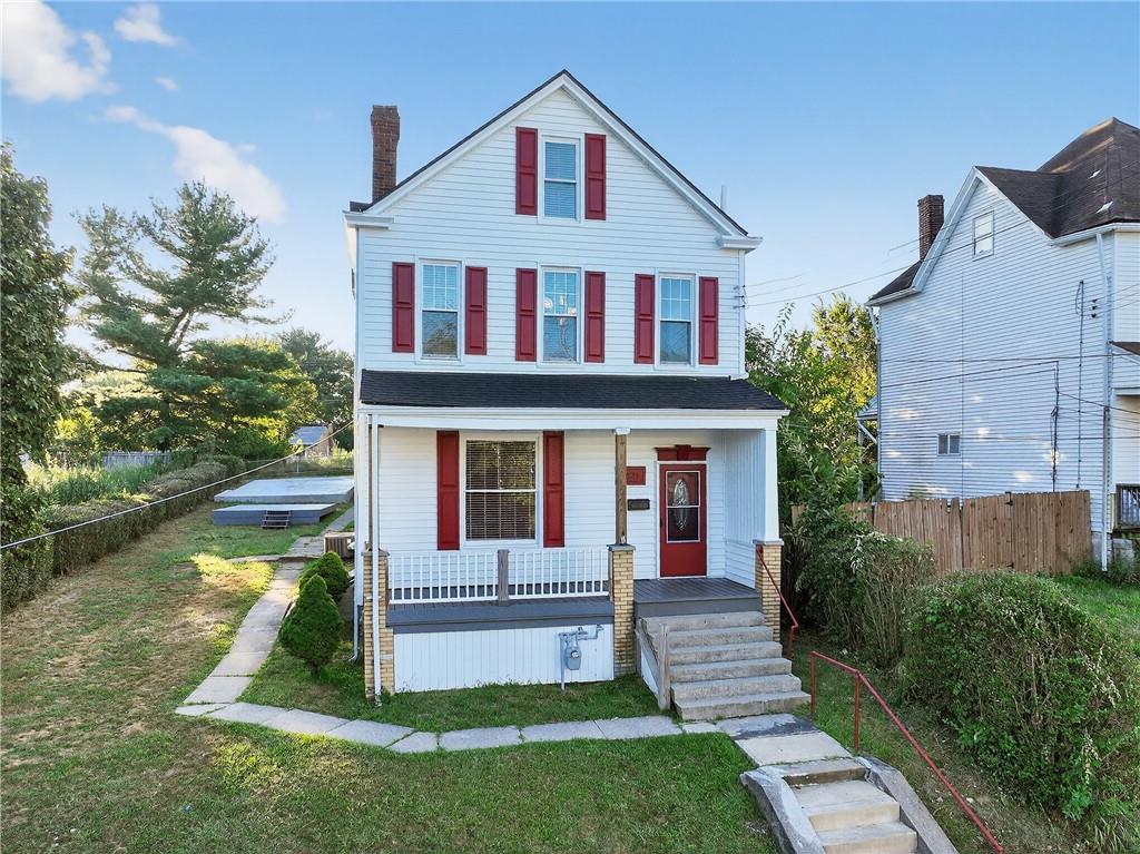 1331 Pritchard Street Pittsburgh, PA 15204 - Photo 49 of 49 a front view of a house with a yard