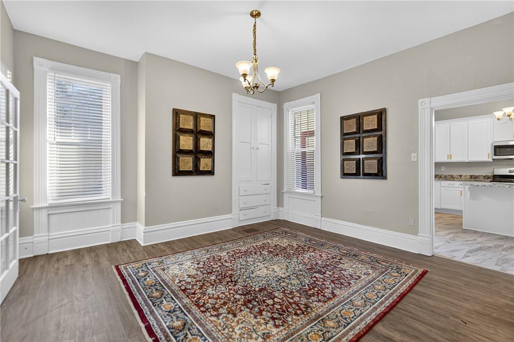 1331 Pritchard Street Pittsburgh, PA 15204 - Photo 9 of 49 a view of an empty room with window and wooden floor