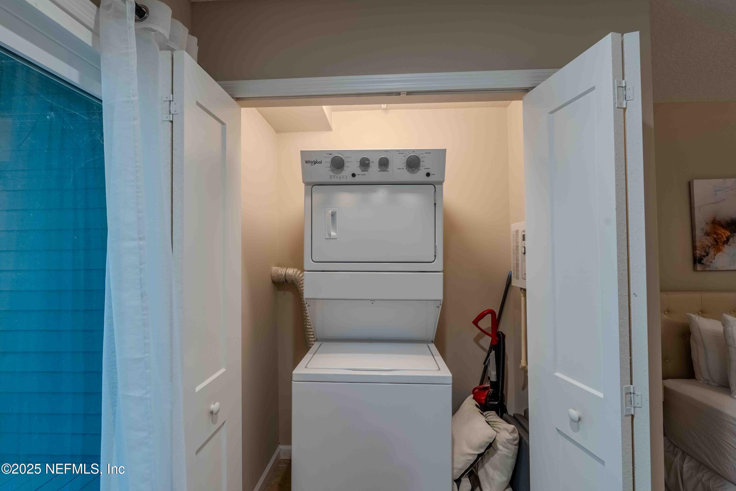 3145 Ravines Road Middleburg, FL 32068 - Photo 19 of 26 a utility room with dryer and washer