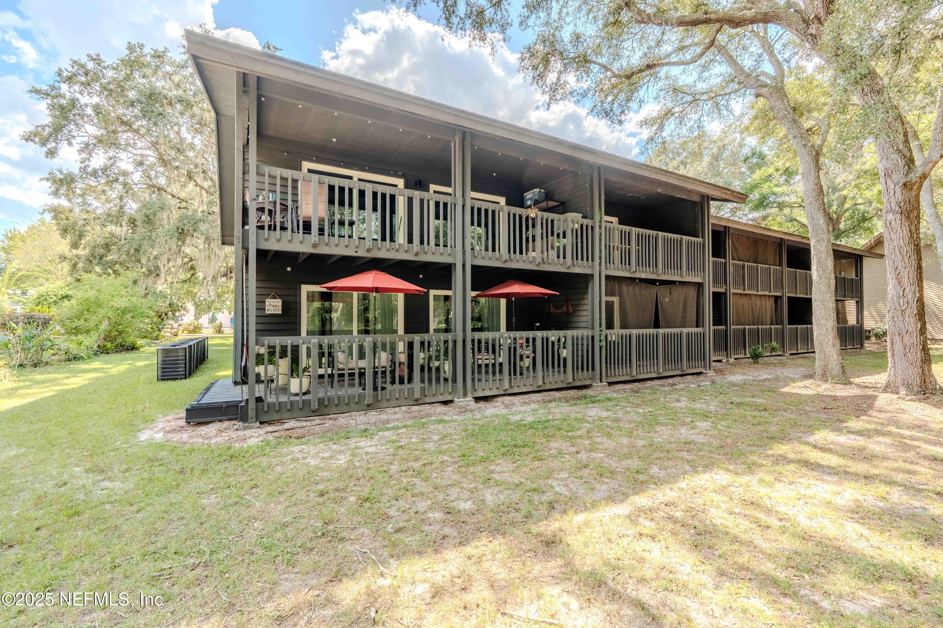 3145 Ravines Road Middleburg, FL 32068 - Photo 6 of 26 a view of a house with backyard and sitting area