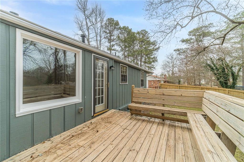 1678 Pounds Road Southwest Stone Mountain, GA 30087 - Photo 22 of 25 a view of a house with a large window