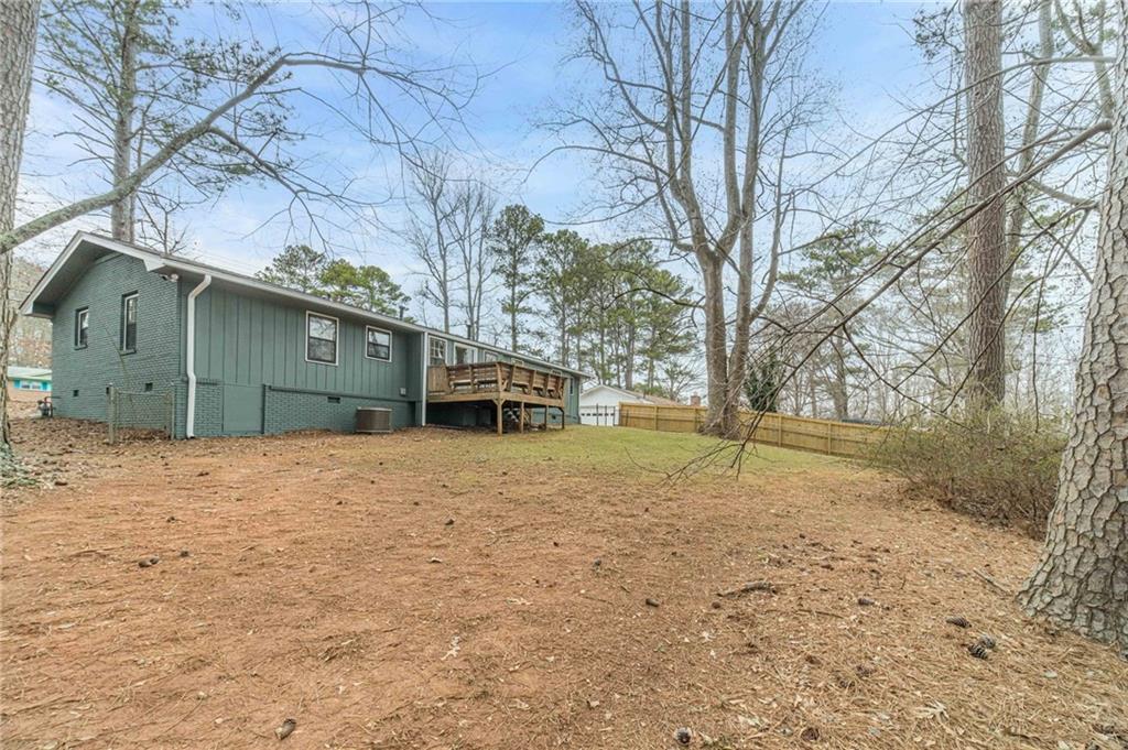 1678 Pounds Road Southwest Stone Mountain, GA 30087 - Photo 23 of 25 a house view with a outdoor space