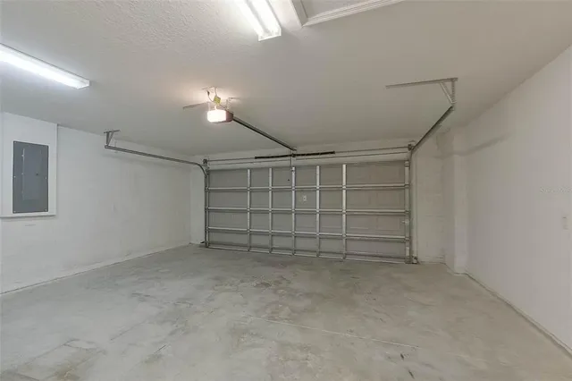 a view of an empty room with a staircase