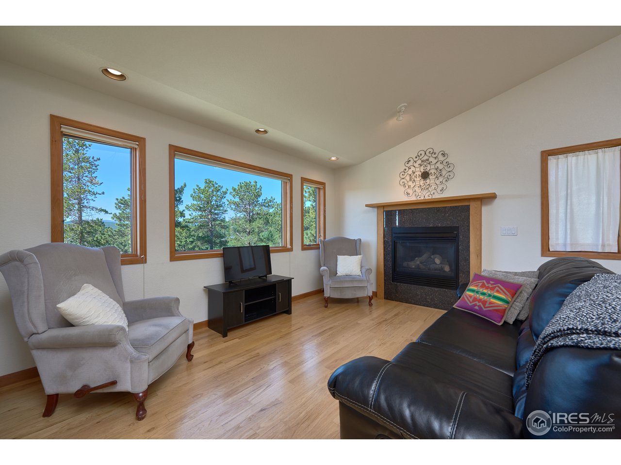 1580 Ridge Road Nederland, CO 80466 - Photo 8 of 31 Gas Fireplace Upstairs Living Room