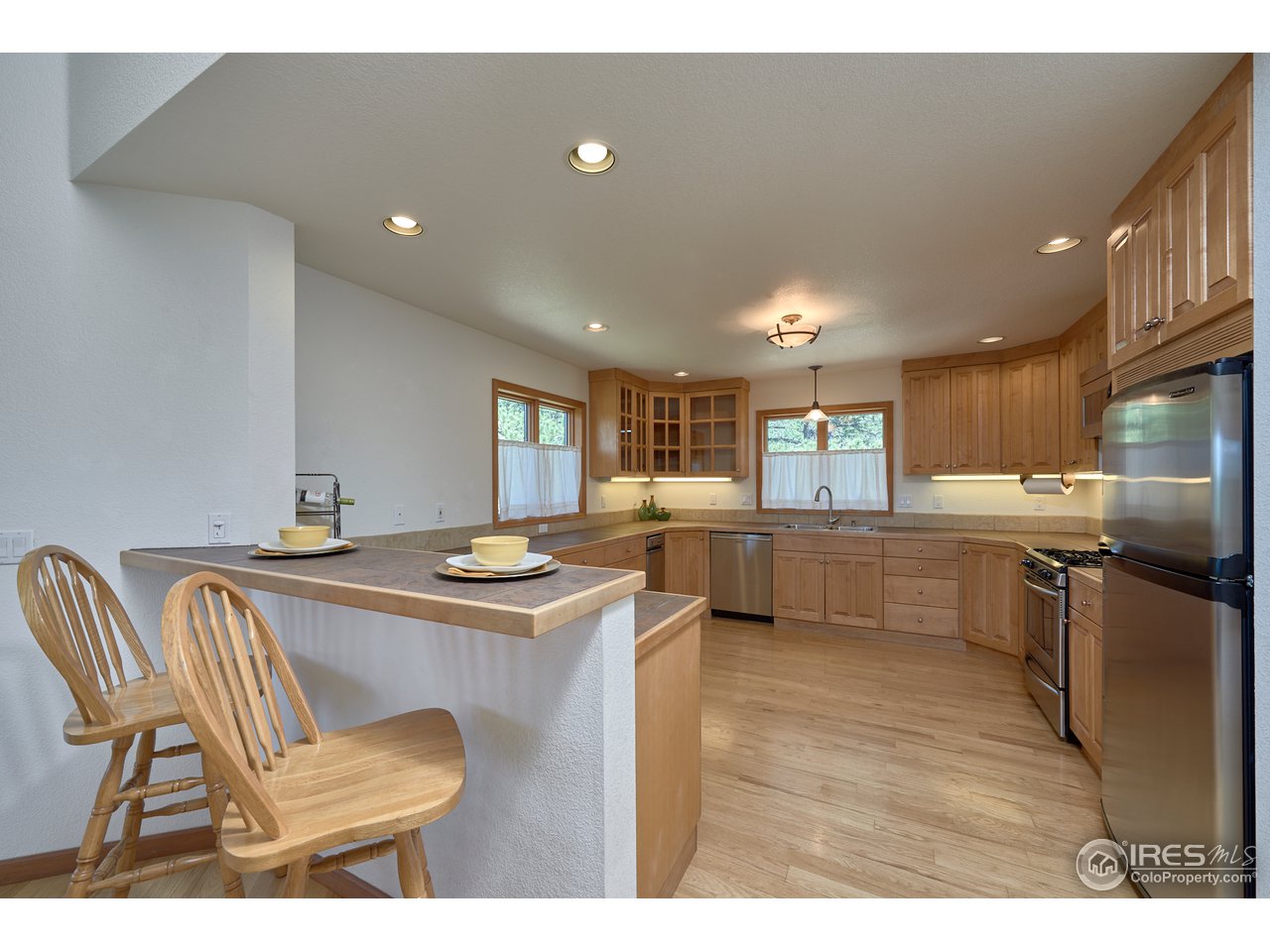 1580 Ridge Road Nederland, CO 80466 - Photo 9 of 31 Main Level Kitchen - Breakfast Bar