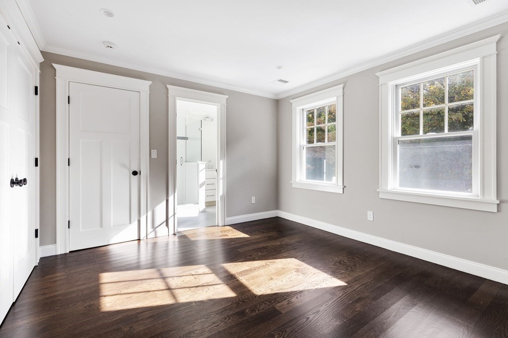 19 Turner Road Wellesley, MA 02482 - Photo 15 of 23 a view of an empty room with wooden floor and a window