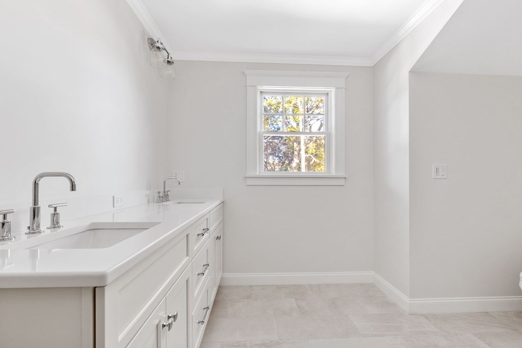 19 Turner Road Wellesley, MA 02482 - Photo 18 of 23 a view of a bathroom with 2 sink and a window