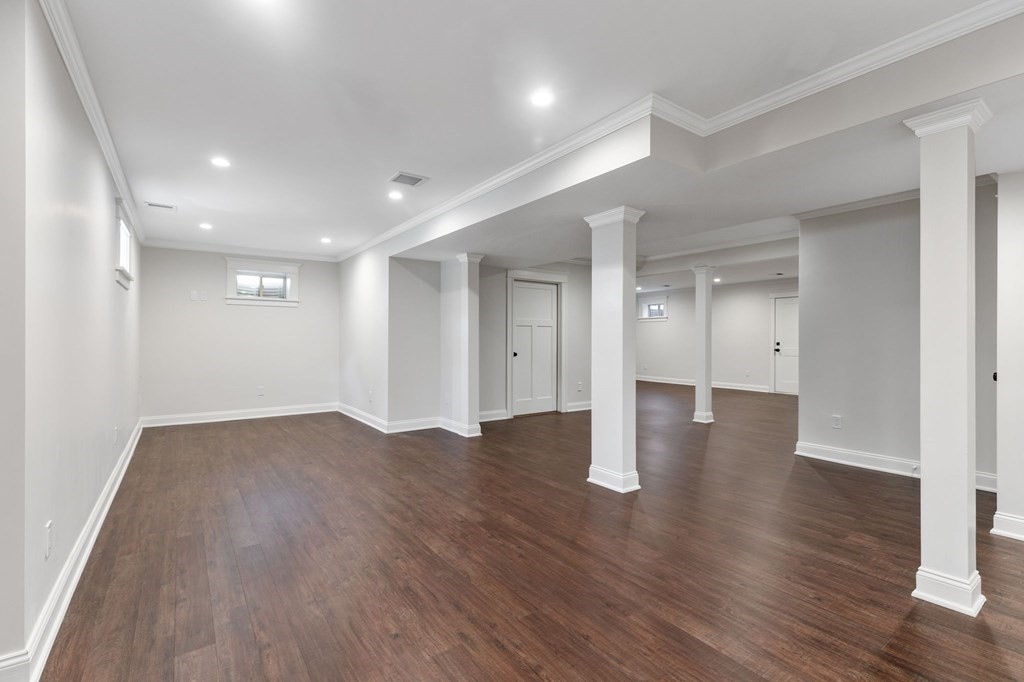 19 Turner Road Wellesley, MA 02482 - Photo 21 of 23 a view of an empty room with wooden floor and a window