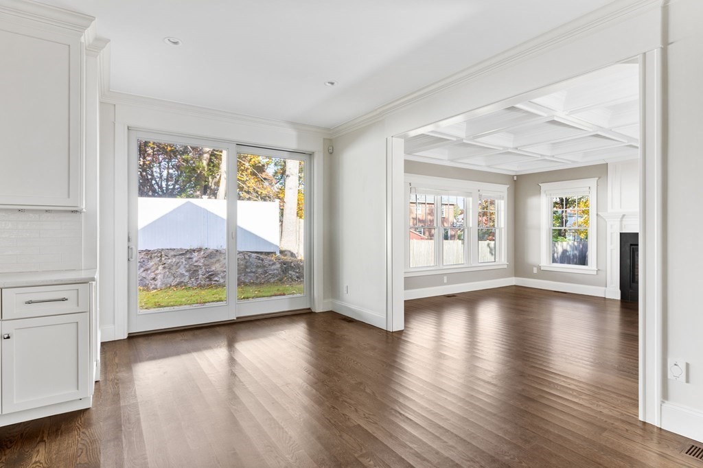 19 Turner Road Wellesley, MA 02482 - Photo 4 of 23 a view of an empty room with wooden floor and a window