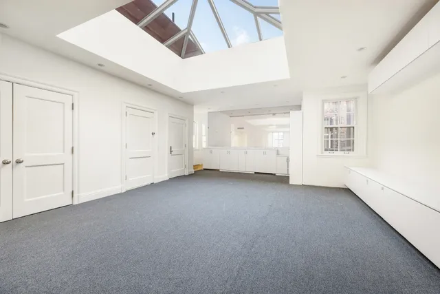 an empty room with windows