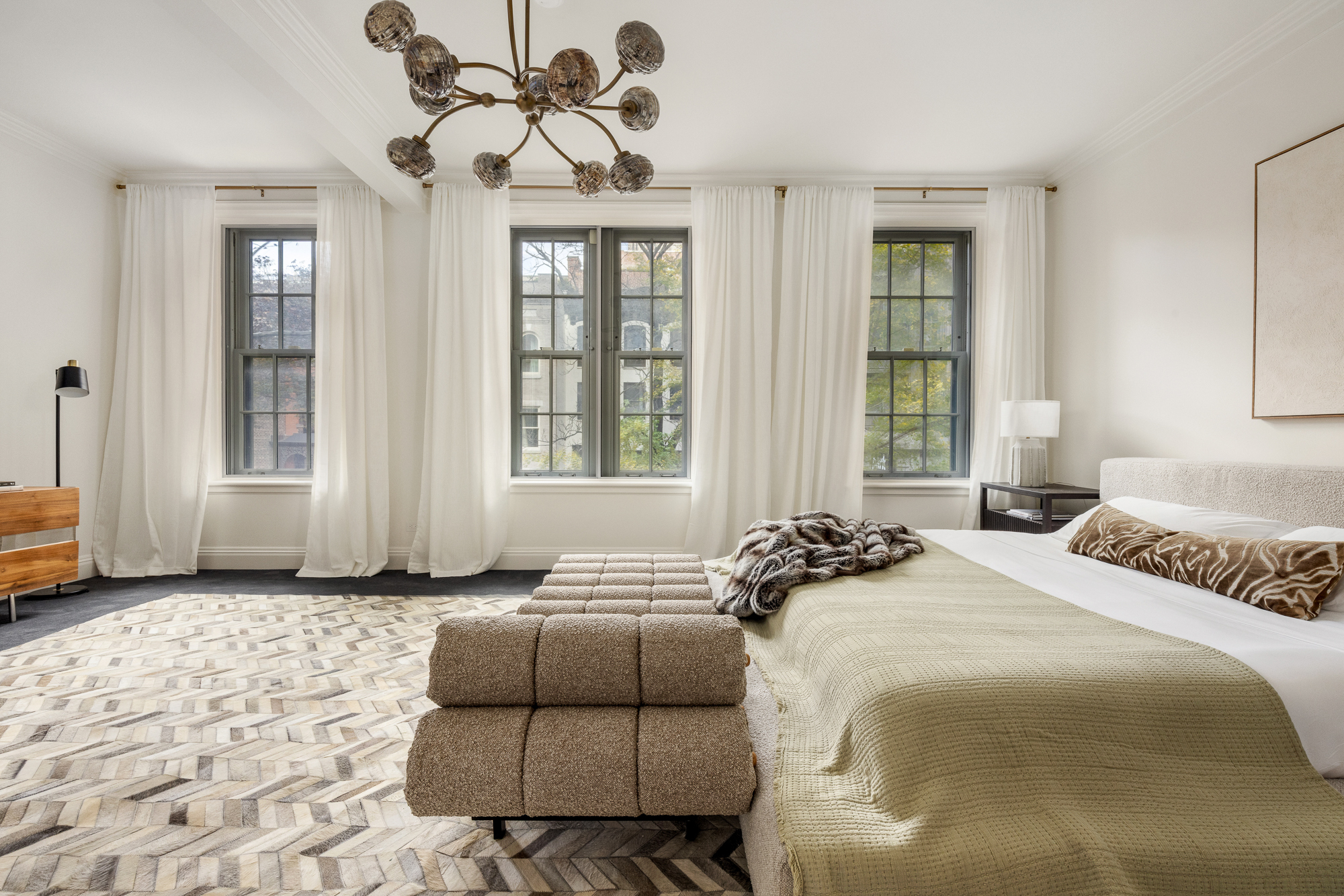 178 East 73rd Street Manhattan, NY 10021 - Photo 8 of 16 a bedroom with a bed and a window