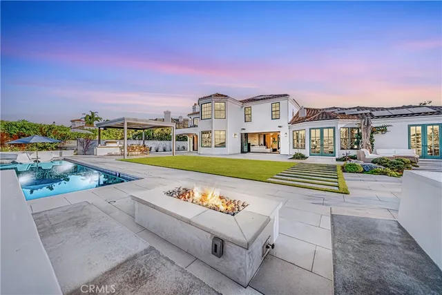 a living room with furniture and flat screen tv