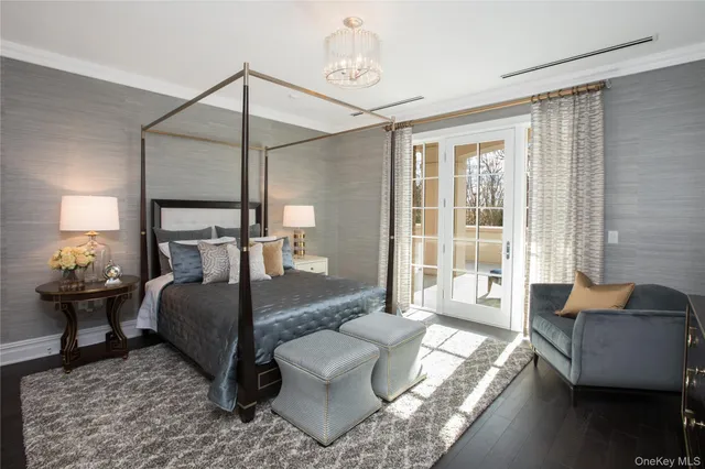 a living room with furniture and a lamp