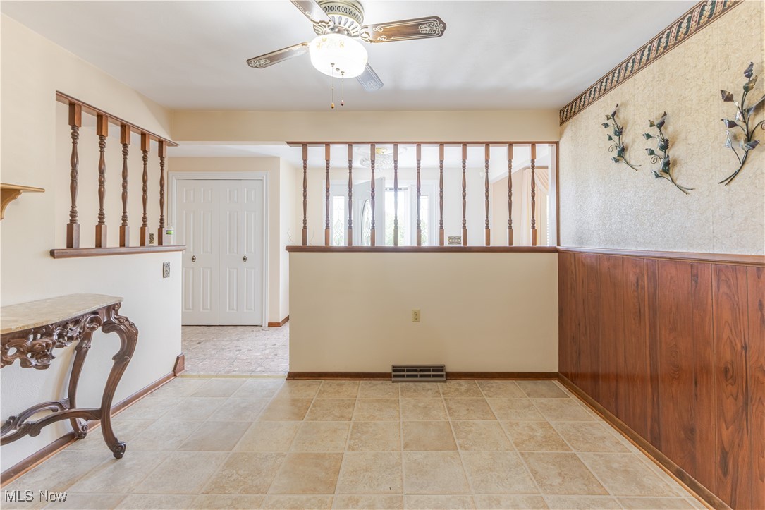 155 Forest Road Weirton, WV 26062 - Photo 10 of 28 Unfurnished room featuring ceiling fan and light tile patterned floors