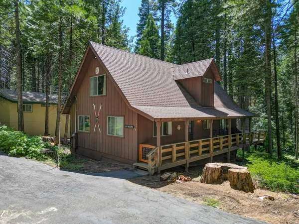 a house with trees in front of it