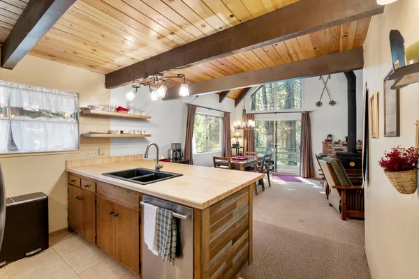 a kitchen that has a stove and a oven