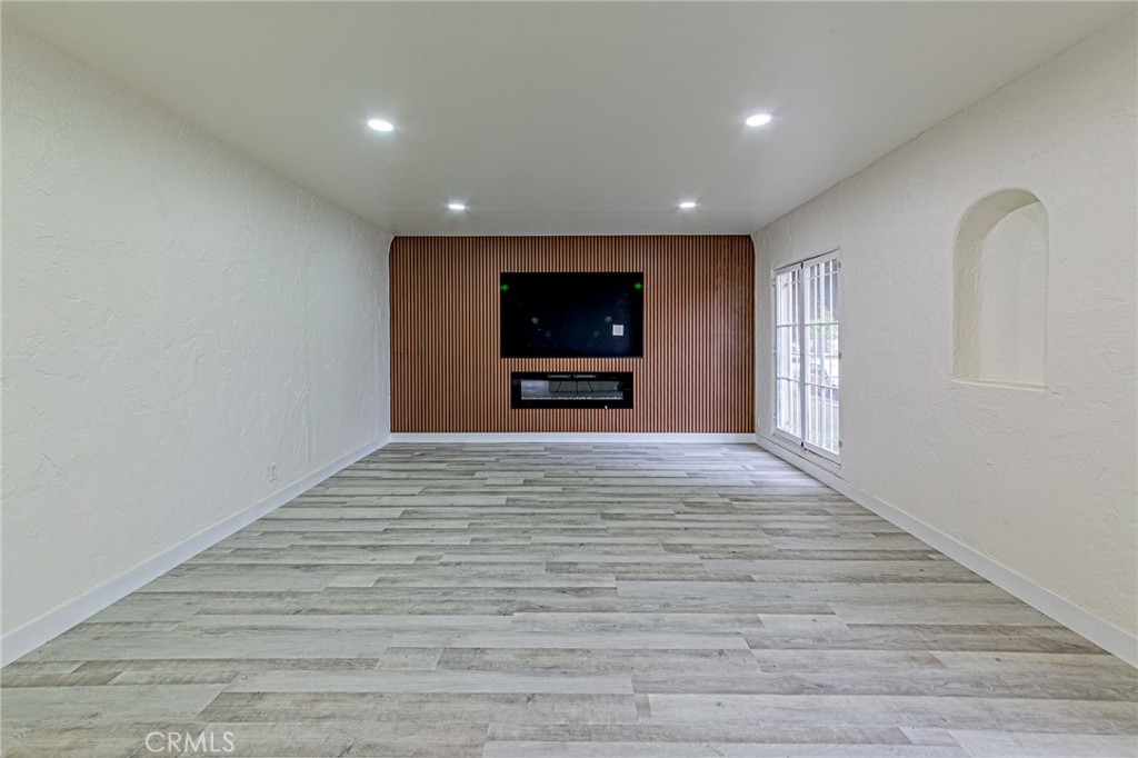 5355 West 8th Street Los Angeles, CA 90036 - Photo 15 of 32 a view of a livingroom with a flat screen tv